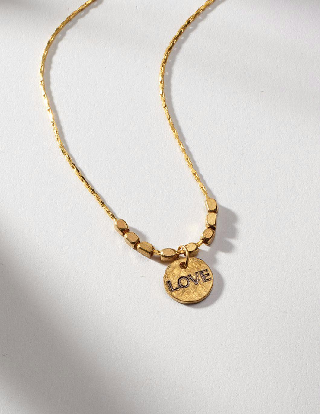 brass-hand-stamped-love-necklace-on-delicate-vintage-chain